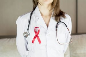 What are the symptoms of breast cancer?